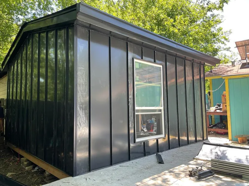 Black standing seam metal wall panels for Metal Roof Installation in Fairhope